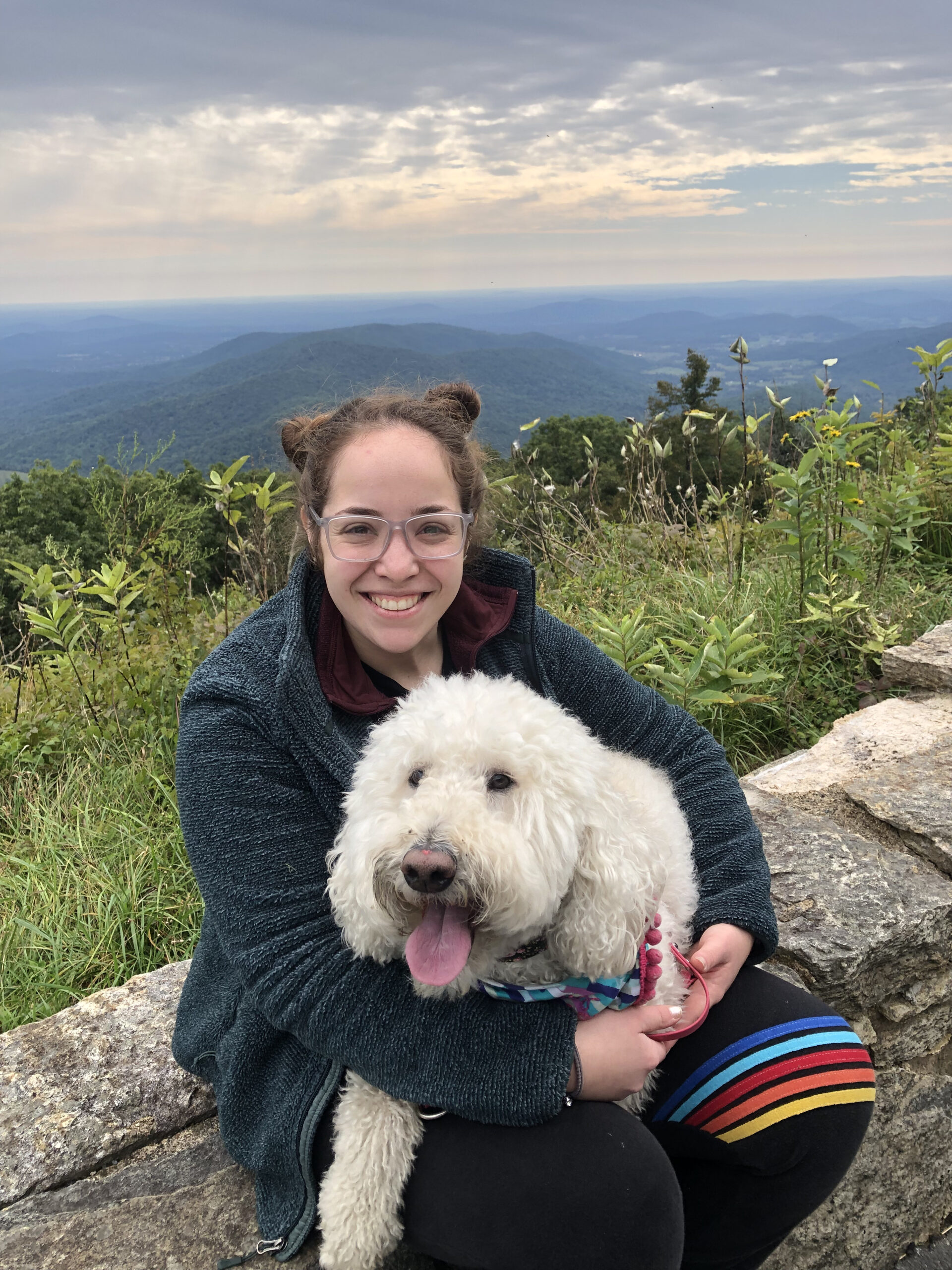 Emma with her service dog Sophie at an overlook in Shenandoah